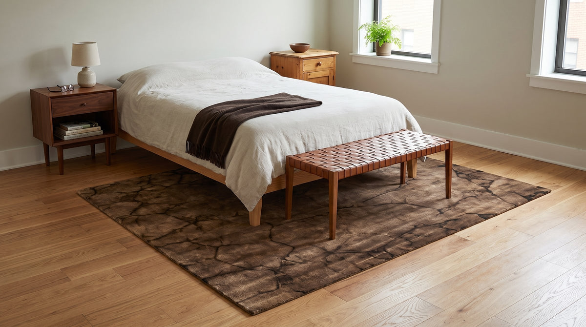 Artistic Brown Hand Knotted Wool Rug in a bedroom