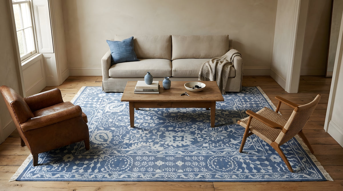 Ava Agra Blue Hand Knotted Wool & Bamboo Silk Rug in a living room