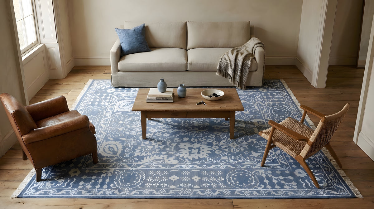 Ava Agra Blue Hand Knotted Wool & Bamboo Silk Rug in a living room