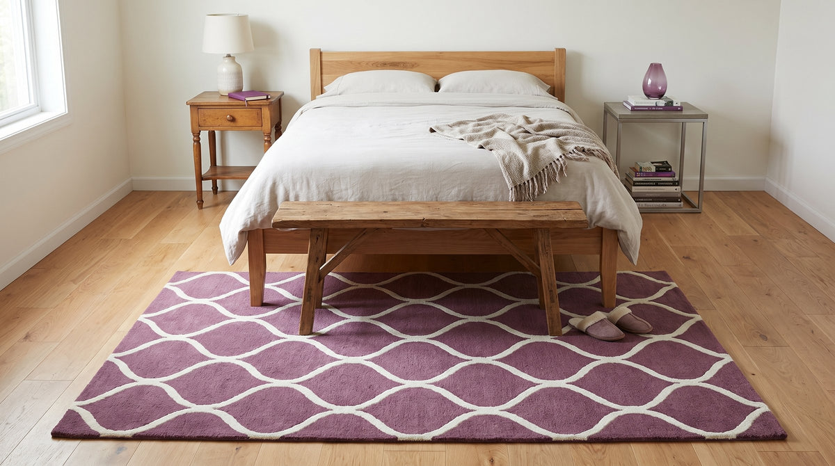 Ava Exquisite Burgundy Hand Tufted Wool Rug in a bedroom