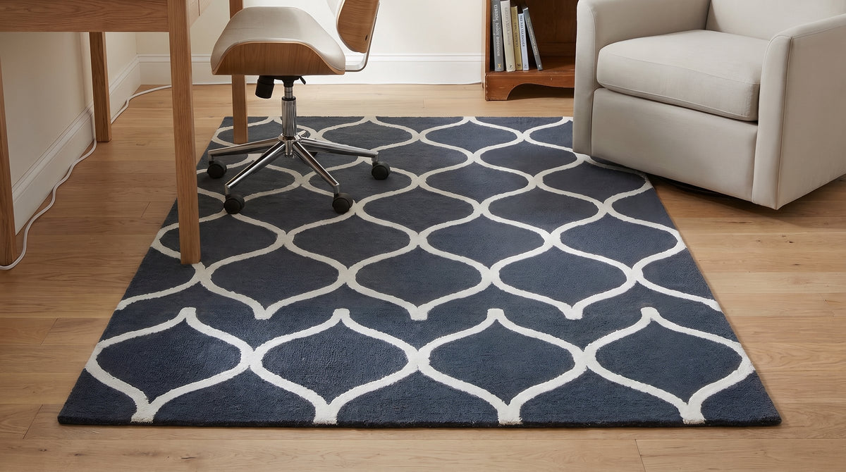 Beautiful Luna Black Hand Tufted Wool Rug in a home office