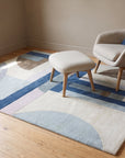 Bespoke Iris Multicolor Hand Tufted Wool Rug in a reading nook