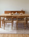 Bespoke Versatile Pink and Gray Hand Tufted Wool Rug in a dining room