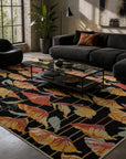 Black floral contemporary rug styled in a modern living room