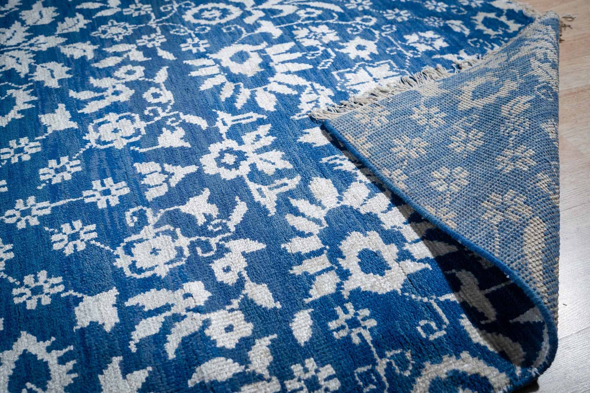 Blue ivory Oushak rug back and field detail