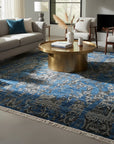 Blue modern floral hand-knotted wool and bamboo silk rug MR6907BL styled in a room, overhead view