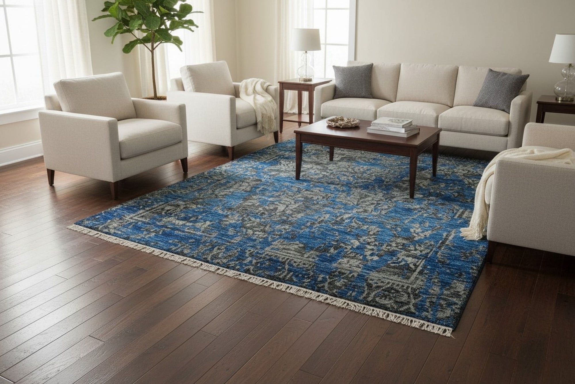 Blue modern floral hand-knotted wool and bamboo silk rug MR6907BL shown in a styled interior setting