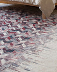 Brenda Refined Multicolor Flatweave Wool Rug in a bedroom