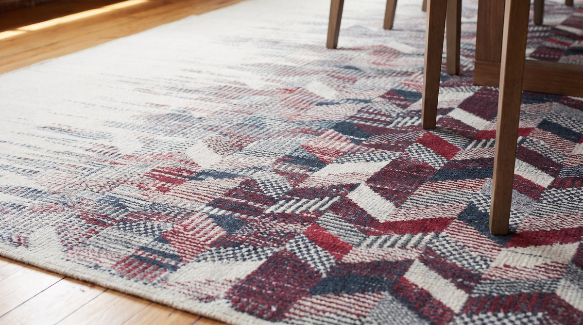 Brenda Refined Multicolor Flatweave Wool Rug in a dining room