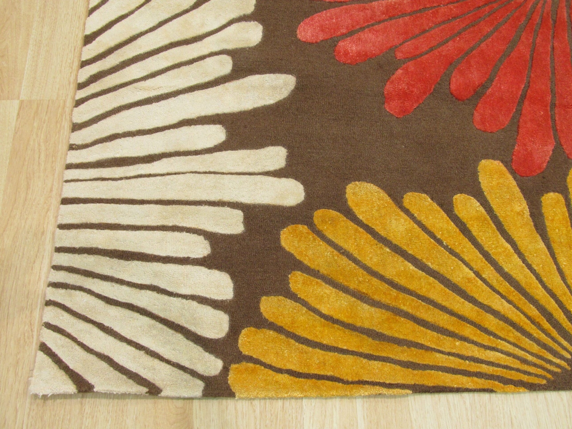 Brown transitional floral rug corner detail