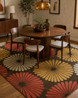 Brown transitional floral rug styled in a mid-century dining room