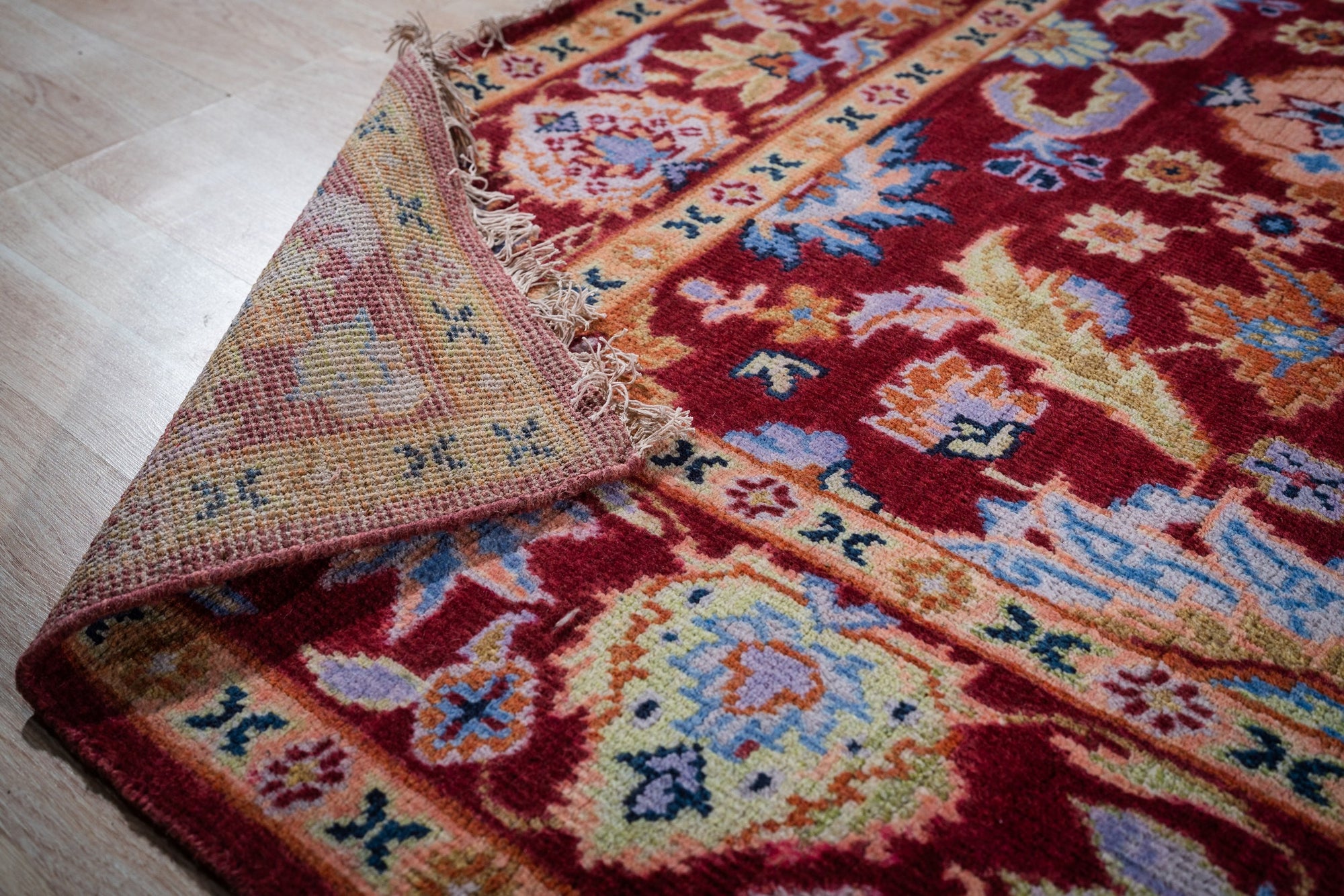 Burgundy Oushak rug back and border detail