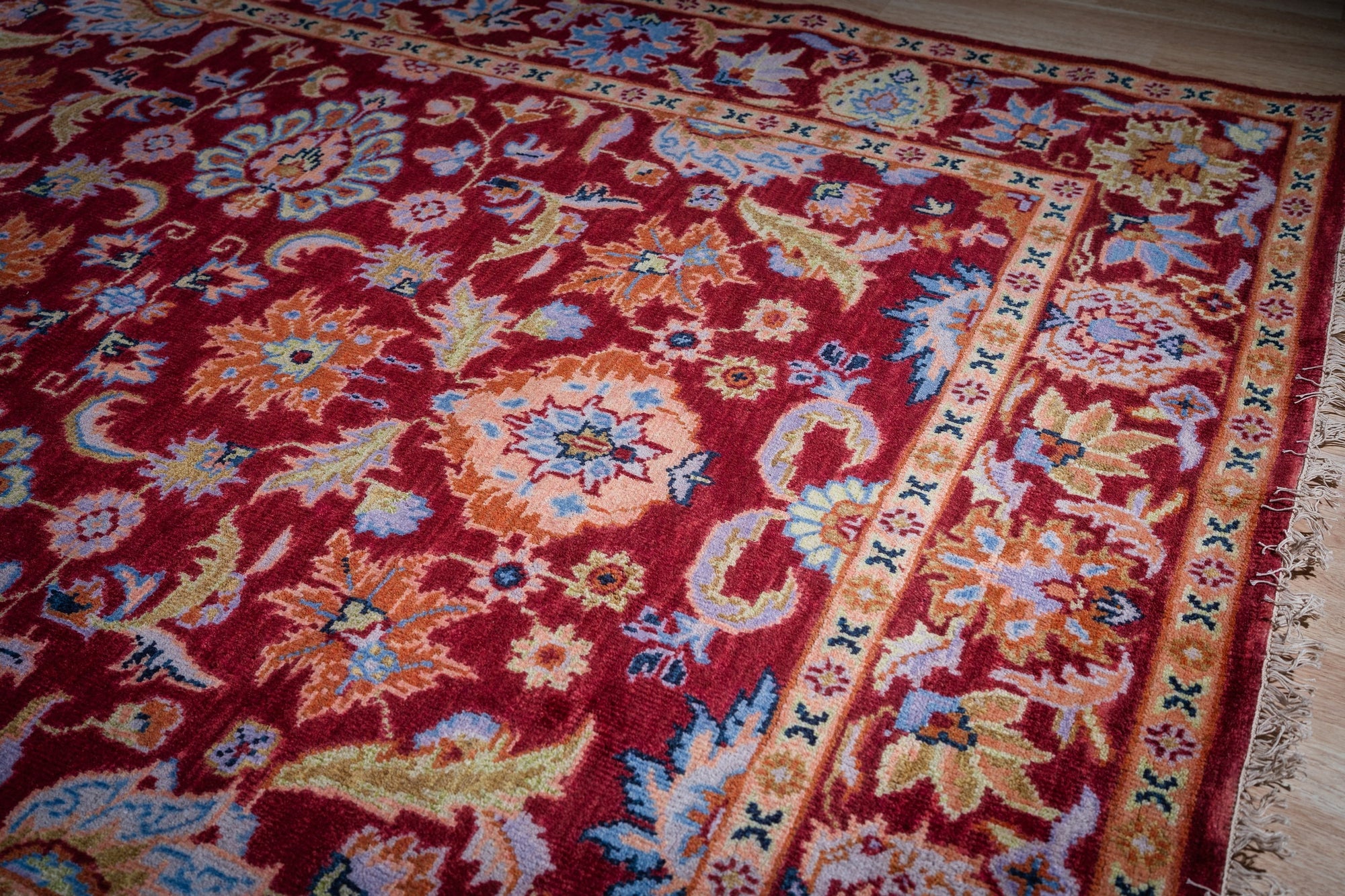 Burgundy Oushak rug field and border detail