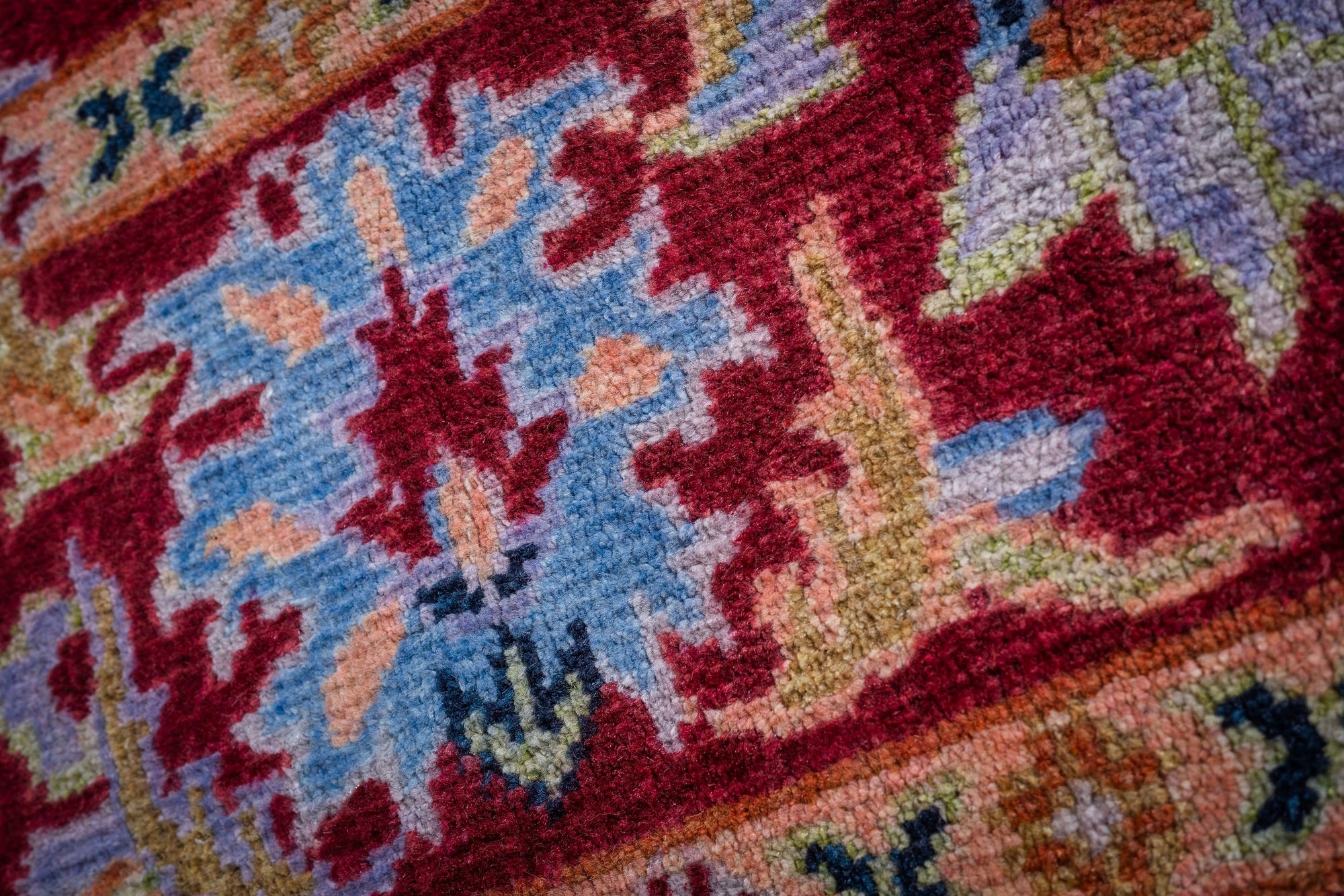 Burgundy Oushak rug floral palmette motif close-up