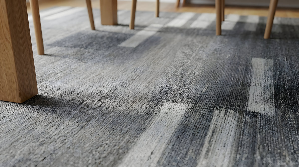Cassandra Clara Gray and Ivory Flatweave Wool Rug in a dining room