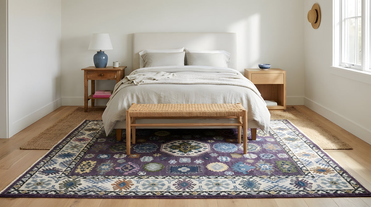 Cassandra Kazak Purple Hand Knotted Wool Rug in a bedroom