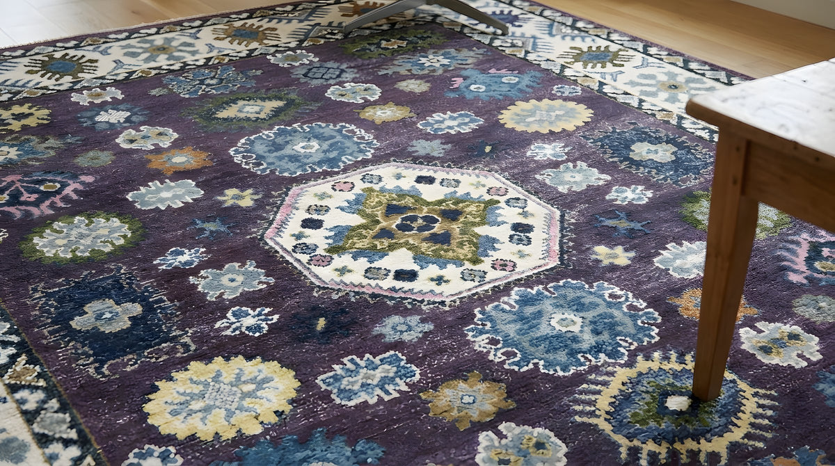 Cassandra Kazak Purple Hand Knotted Wool Rug in a living room