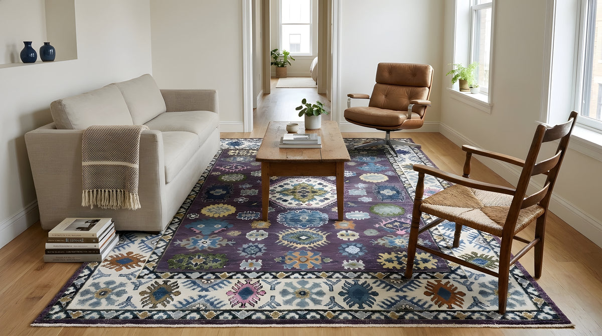 Cassandra Kazak Purple Hand Knotted Wool Rug in a living room