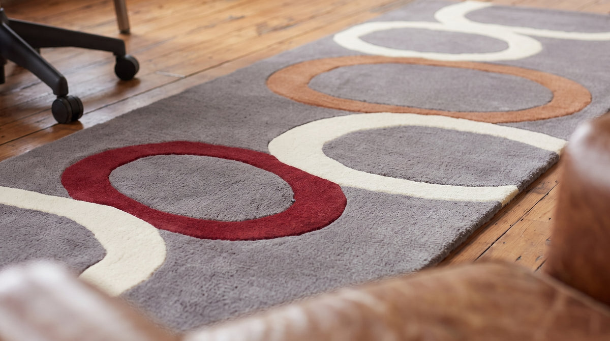Celia Clara Gray Hand Tufted Wool Rug in a home office