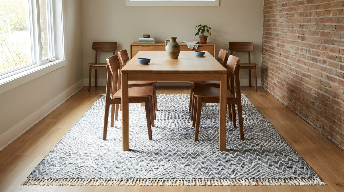 Celia Kilim Gray and Ivory Handmade Wool Rug in a dining room