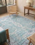 Celia Modern Green Hand Knotted Silk Rug in a sunroom