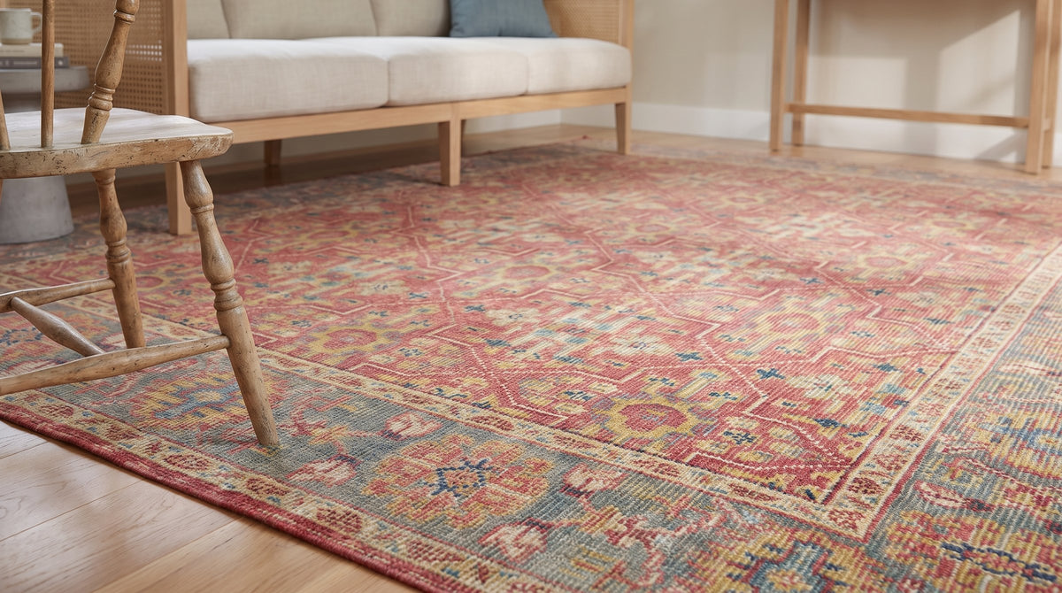 Celia Oushak Rust Hand Knotted Wool Rug in a sunroom