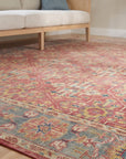 Celia Oushak Rust Hand Knotted Wool Rug in a sunroom
