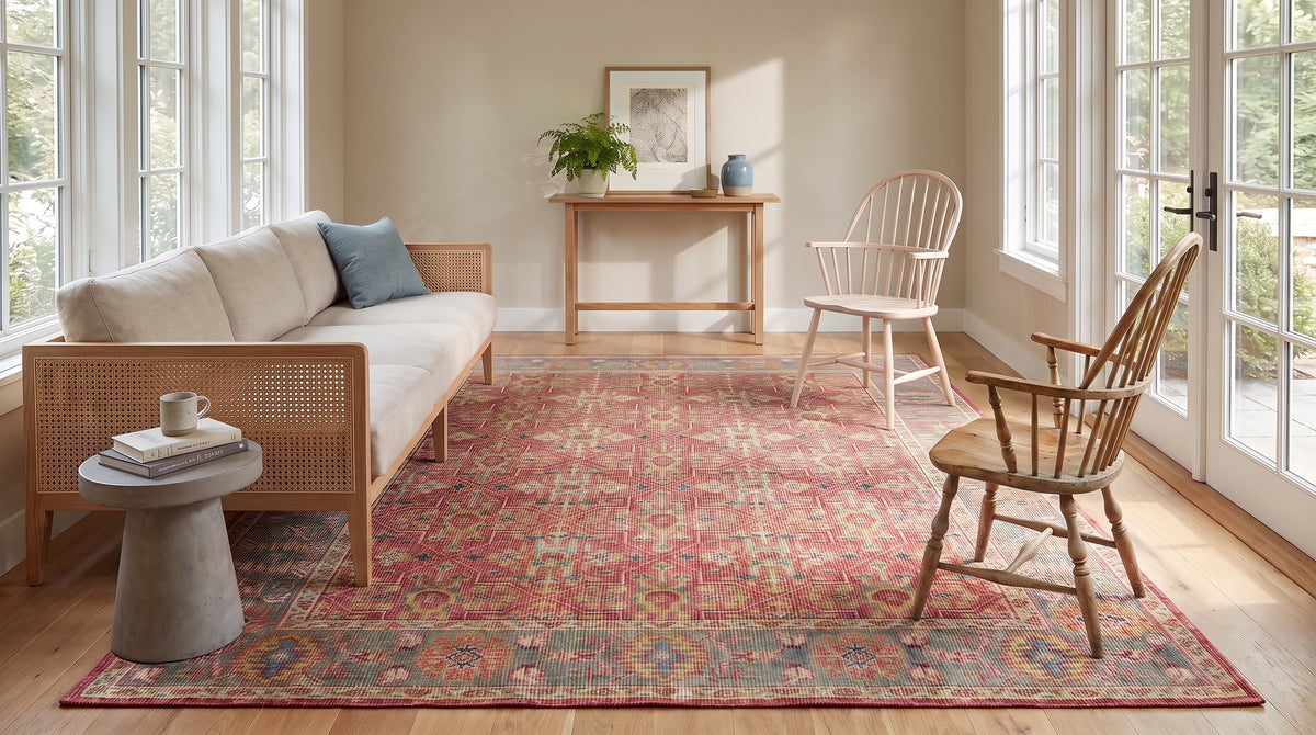 Celia Oushak Rust Hand Knotted Wool Rug in a sunroom