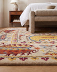 Chic Delicate Ivory Hand Tufted Wool Rug in a bedroom
