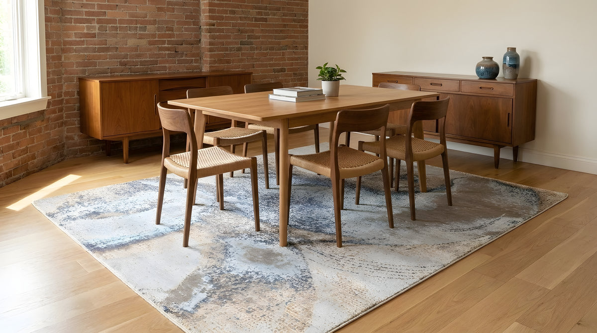 Classic Lydia Silver Hand Knotted Wool Rug in a dining room