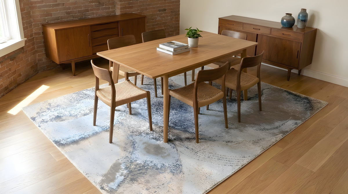 Classic Lydia Silver Hand Knotted Wool Rug in a dining room