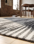 Classic Mira Gray Hand Knotted Wool Rug in a dining room