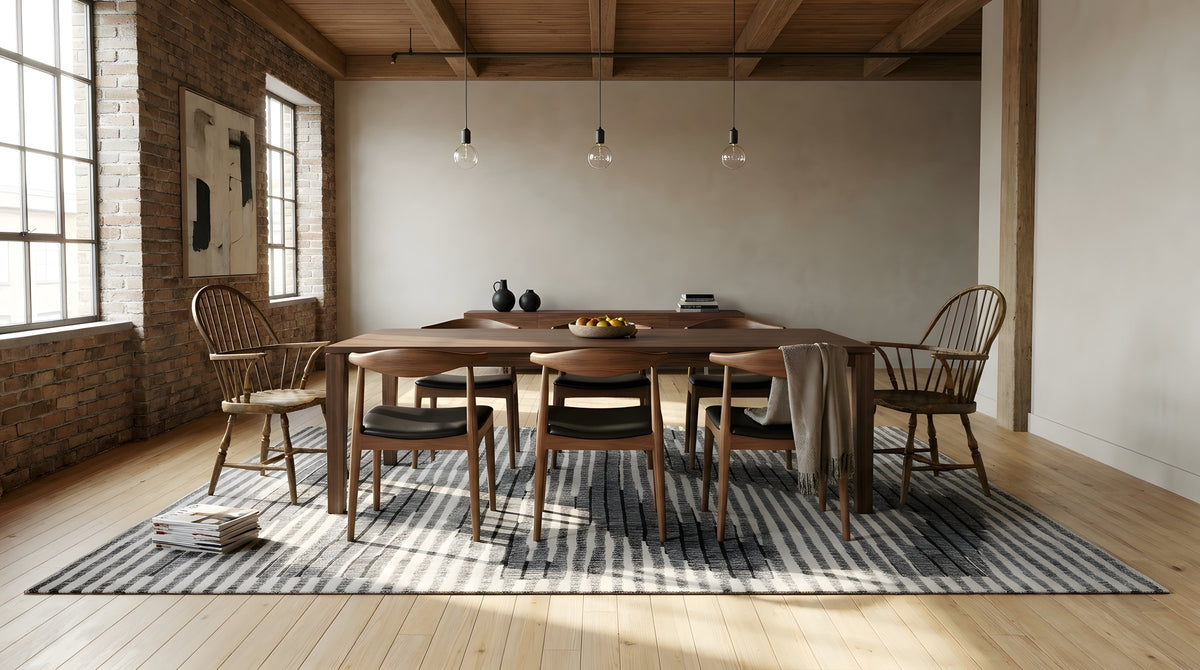 Classic Mira Gray Hand Knotted Wool Rug in a dining room
