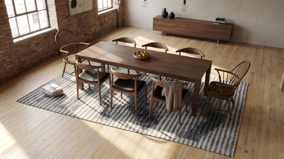 Classic Mira Gray Hand Knotted Wool Rug in a dining room