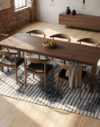 Classic Mira Gray Hand Knotted Wool Rug in a dining room