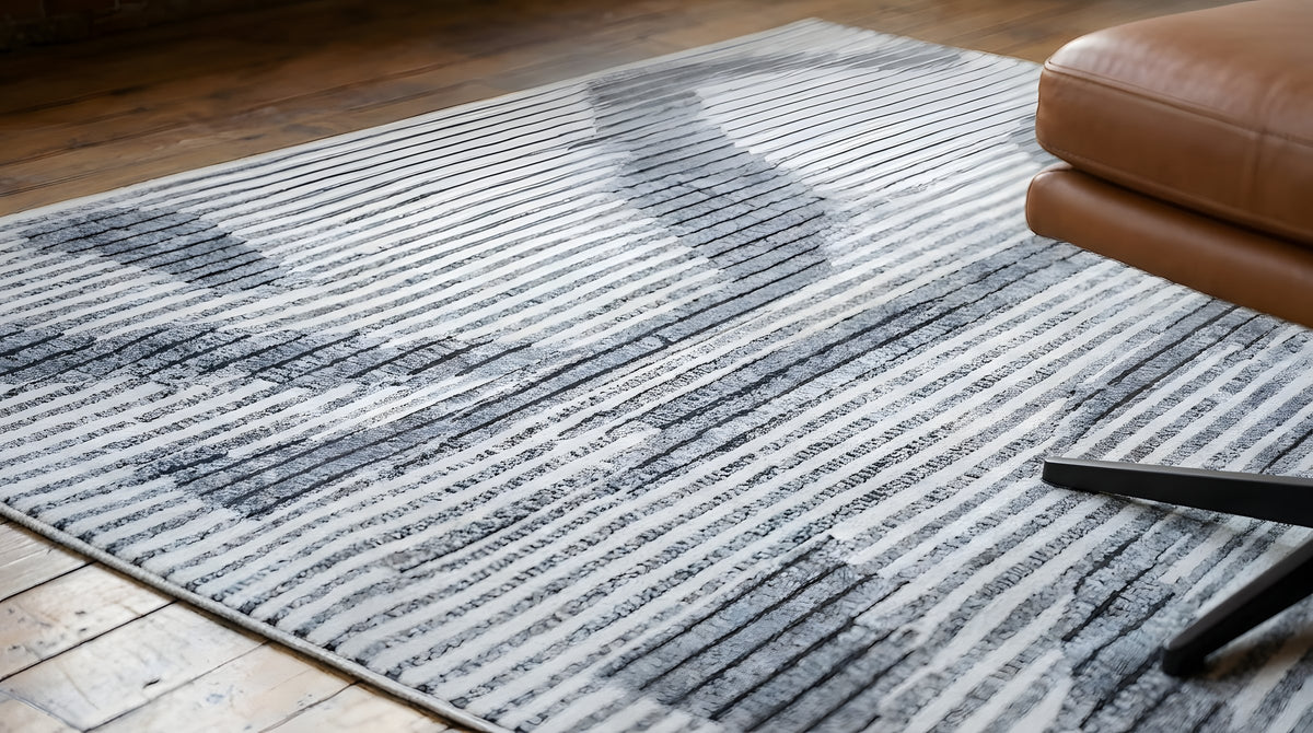Classic Mira Gray Hand Knotted Wool Rug in a reading nook