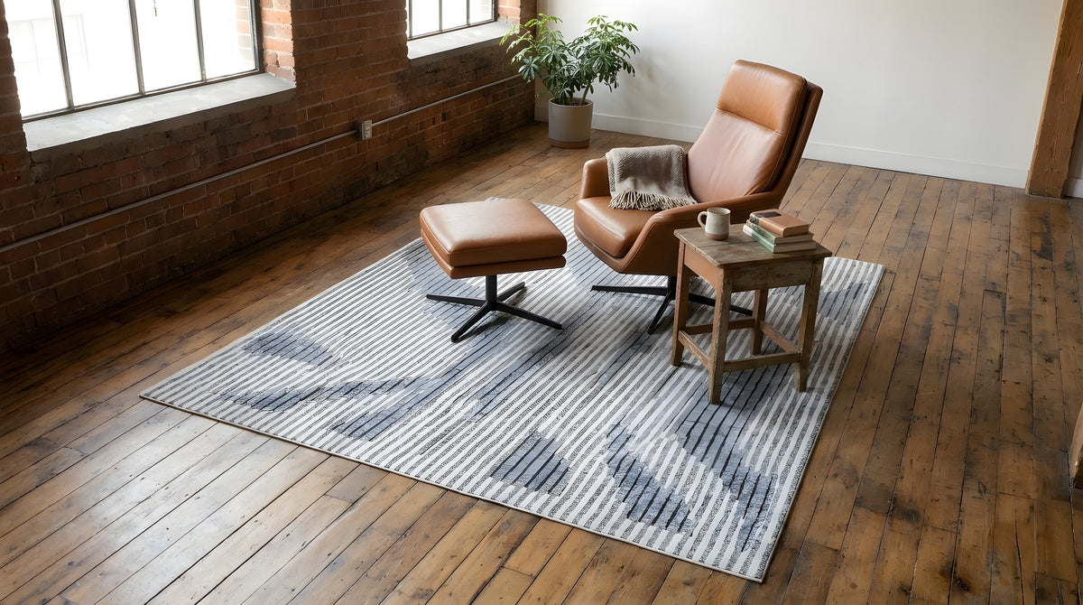 Classic Mira Gray Hand Knotted Wool Rug in a reading nook