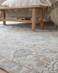 Classic Tessa Beige Hand Knotted Wool Rug in a bedroom