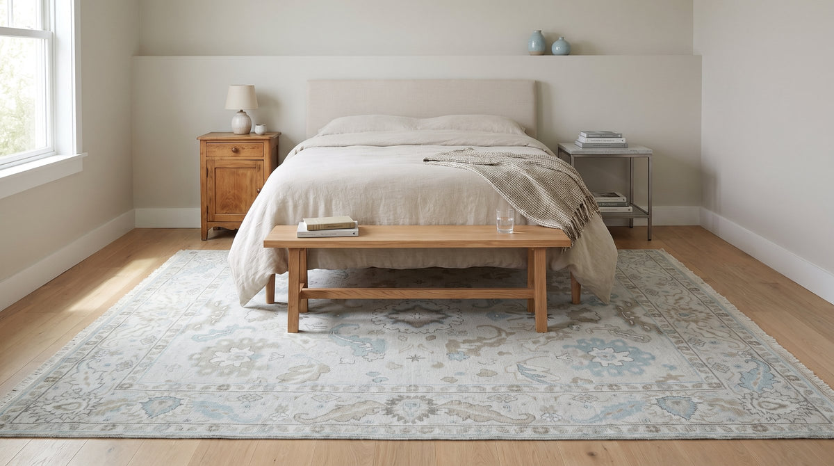 Classic Tessa Beige Hand Knotted Wool Rug in a bedroom