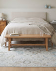 Classic Tessa Beige Hand Knotted Wool Rug in a bedroom