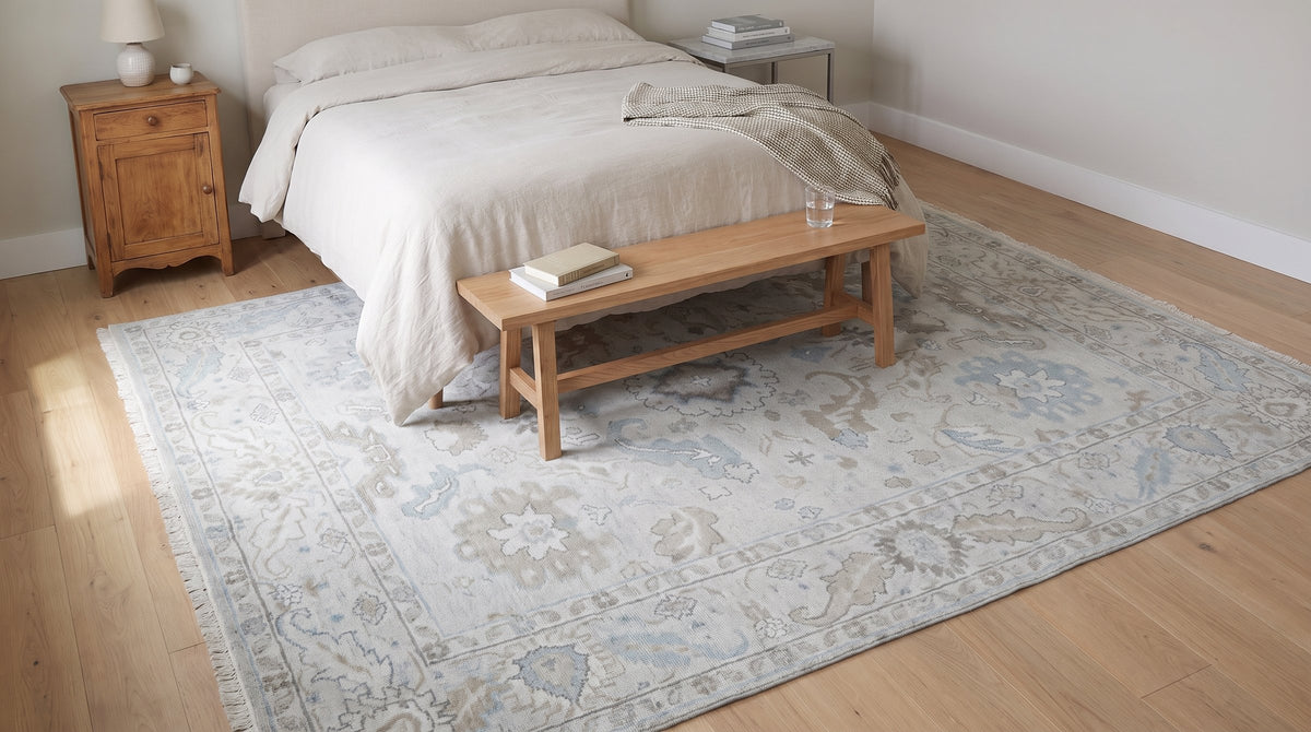 Classic Tessa Beige Hand Knotted Wool Rug in a bedroom