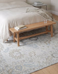Classic Tessa Beige Hand Knotted Wool Rug in a bedroom