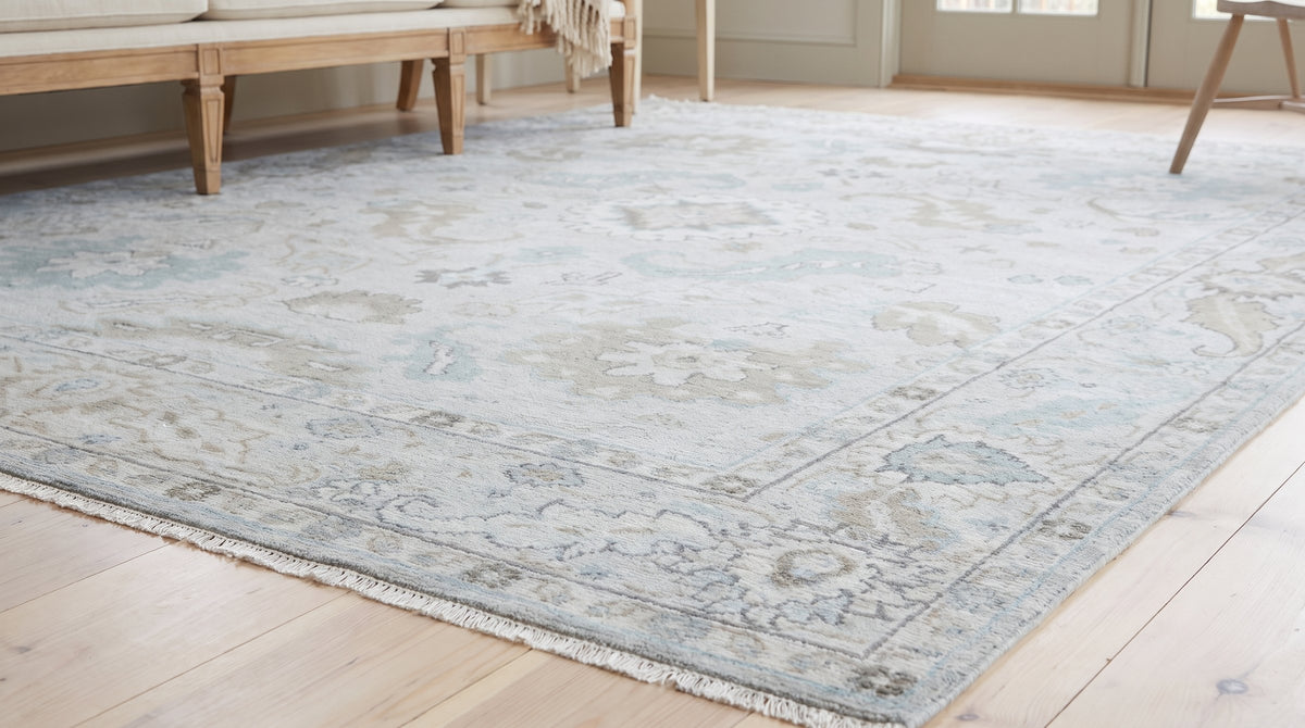 Classic Tessa Beige Hand Knotted Wool Rug in a sunroom
