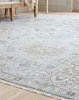 Classic Tessa Beige Hand Knotted Wool Rug in a sunroom