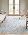 Classic Tessa Beige Hand Knotted Wool Rug in a sunroom