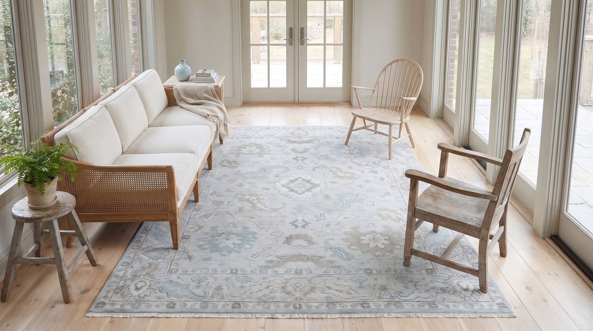 Classic Tessa Beige Hand Knotted Wool Rug in a sunroom