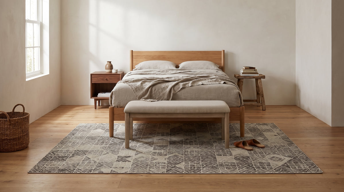 Cozy Quinn Gray Hand Tufted Wool Rug in a bedroom
