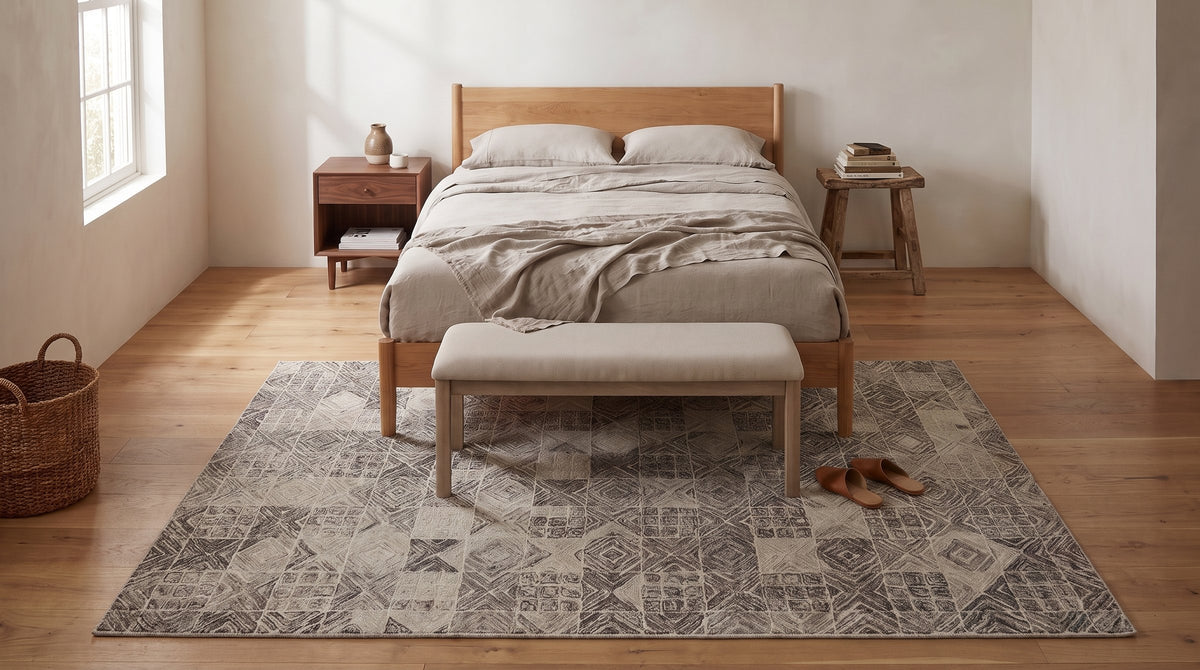 Cozy Quinn Gray Hand Tufted Wool Rug in a bedroom