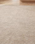Cozy Willow Brown and Ivory Hand Tufted Wool Rug in a kitchen