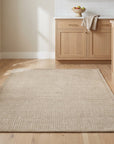 Cozy Willow Brown and Ivory Hand Tufted Wool Rug in a kitchen